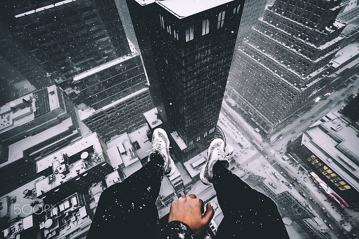 person's pair of white shoes, photo of person sitting and looking down buildings, cityscape, snow, winter, bird's eye view, legs, rooftops, skyscraper, rooftopping, snowing, gray, HD wallpaper