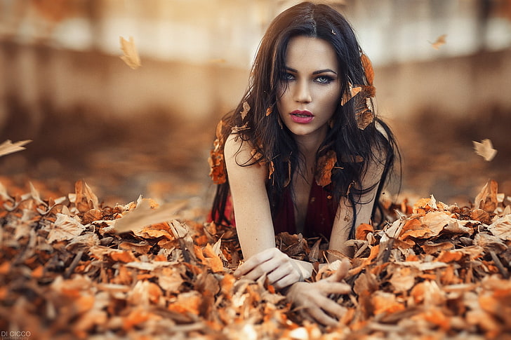 women's red dress, close-up photo of woman in red plunging neckline top on brown leaf flowers, women, model, Alessandro Di Cicco, brunette, long hair, women outdoors, depth of field, looking at viewer, face, open mouth, makeup, leaves, fall, HD wallpaper