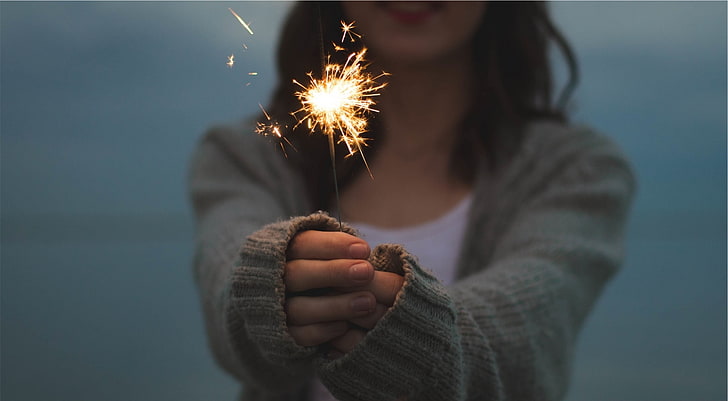 Holding Sparkler, gray sparkler, Holidays, New Year, Girl, People, Woman, Light, Party, Bright, Hands, Fire, Burning, Year, Glow, Celebration, Sparkles, Holding, Sparkler, Sweater, firework, cardigan, HD wallpaper