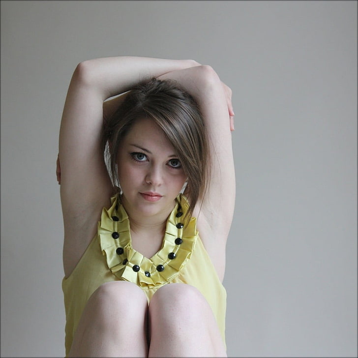 women's yellow sleeveless top, armpits, Imogen Dyer, arms up, portrait, women, simple background, face, HD wallpaper