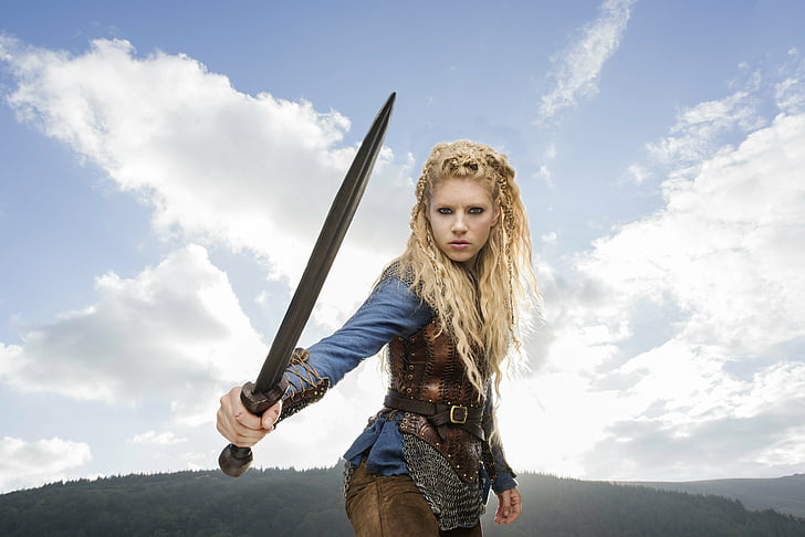 female wearing blue long-sleeved shirt and brown armor holding sword movie character, Lagertha, Katheryn Winnick, Vikings, 8K, 4K, HD wallpaper