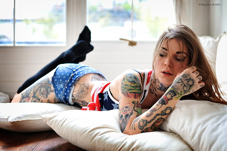 women's white, blue, and red tank top, girl, pose, sofa, body, tattoo, shorts, legs, photographer, lying, Giovanni Zacche, HD wallpaper