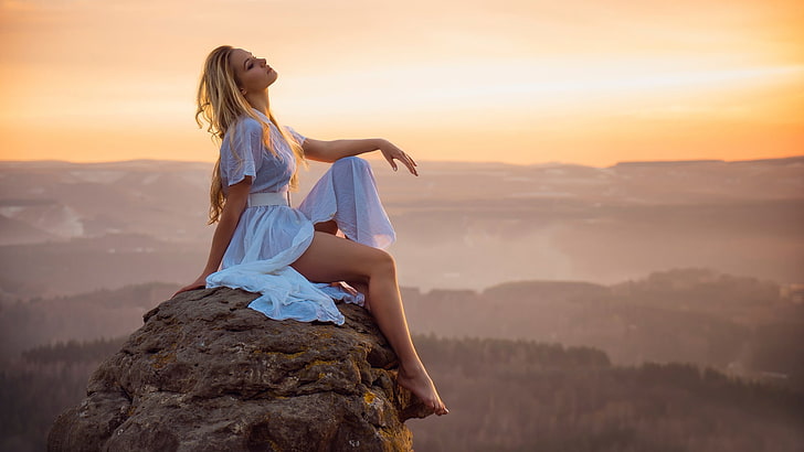 woman wearing white dress, woman wearing white dress sitting on rock formation during golden hour, women outdoors, landscape, model, blonde, HD wallpaper