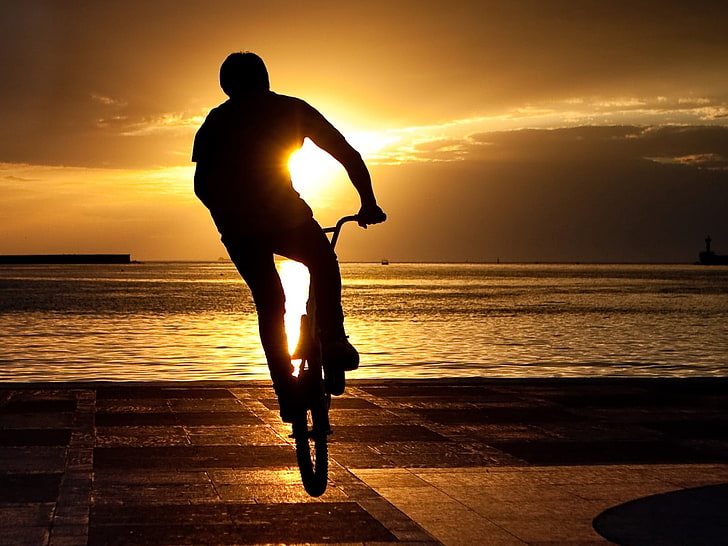 silhouette of man riding bike, bicyclist, trick, jump, extreme, sun, quay, HD wallpaper