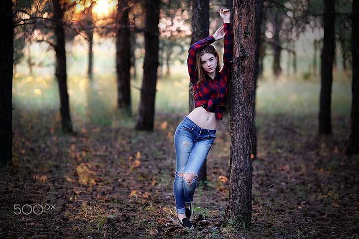 women's red and black plaid sport shirt, untitled, women, portrait, pants, jeans, shirt, torn jeans, sneakers, women outdoors, forest, arms up, pale, leaves, 500px, plaid shirt, HD wallpaper