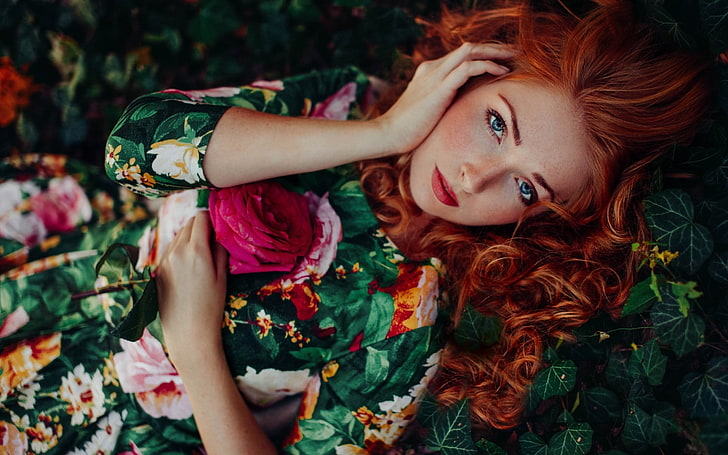 women's green and multicolored floral dress, red haired woman in green floral dress, women, model, redhead, long hair, women outdoors, nature, looking at viewer, blue eyes, leaves, flowers, rose, curly hair, freckles, HD wallpaper