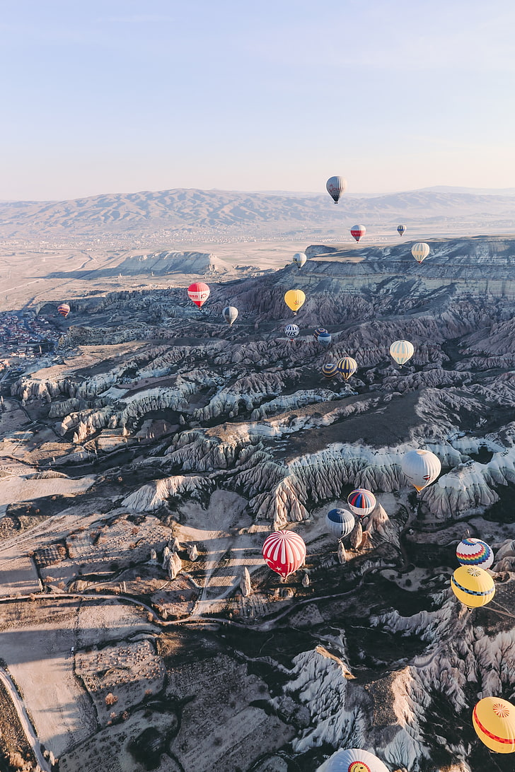 assortiment de montgolfières, montgolfières, roches, vol, vue d'en haut, cappadoce, goreme, Fond d'écran HD, fond d'écran de téléphone