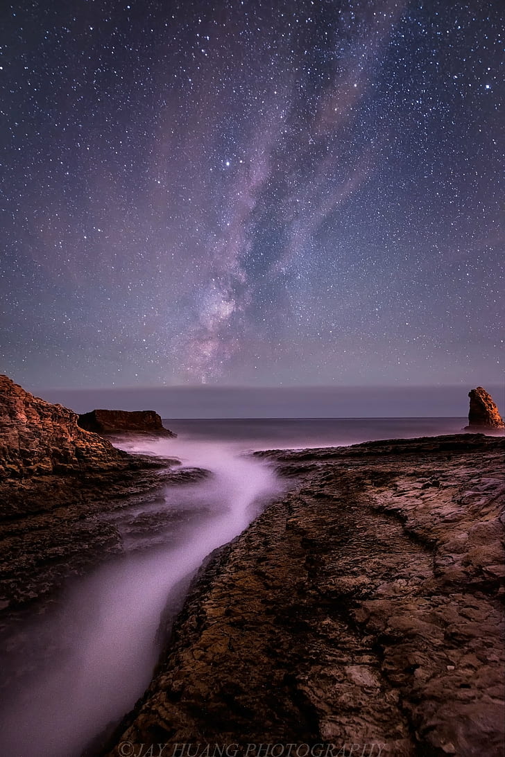brown rock formation during night time, Crack, rock formation, night time, Davenport, Beach, Santa Cruz, Seascape, Ocean  Pacific, Pacific Ocean, Bay Area, Milky Way, Night Photography, star - Space, astronomy, galaxy, night, nature, nebula, landscape, sky, constellation, sea, dark, space, HD wallpaper