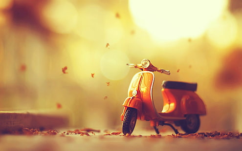 yellow Vespa automatic scooter die-cast, photographed of motor scooter miniature, leaves, fall, toys, motorcycle, tilt shift, HD wallpaper HD wallpaper