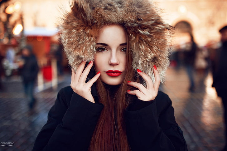 women's black and brown parka coat, selective focus photography of woman wearing fur hoodie, women, model, redhead, face, red lipstick, red nails, fashion, women outdoors, airbrushed, Sasha Spilberg, Ivan Gorokhov, coats, black jackets, brown eyes, HD wallpaper