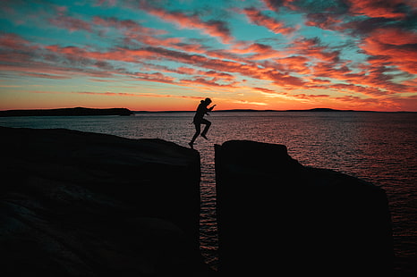 silhouette of person jumping on rock, silhouette, man, jump, sea, HD wallpaper HD wallpaper