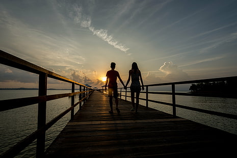 silhouette of man and woman holding hands walking on brown wooden dock during golden hour, with you, silhouette, man and woman, holding hands, walking on, dock, golden hour, Sunset, Resort, Sun, Clouds, Jetty, Blue  Light, Landscape, outdoors, sea, people, nature, women, beach, sky, bridge - Man Made Structure, two People, HD wallpaper HD wallpaper
