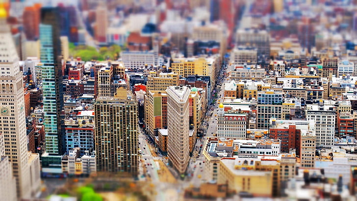 white and brown city buildings, assorted-color buildings focus photography, tilt shift, New York City, city, cityscape, building, skyscraper, road, USA, clock tower, Flatiron Building, HD wallpaper