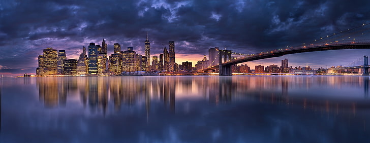 bridge painting, Panoramic photography of cityscape and body of water, landscape, cityscape, skyscraper, bridge, lights, clouds, Manhattan, New York City, evening, architecture, water, panoramas, modern, urban, building, reflection, sea, Brooklyn Bridge, HD wallpaper