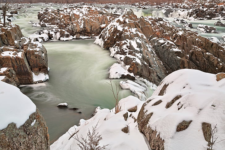 body of water surrounded by snow filled rock formation, HDR, body of water, snow, rock formation, waterfall, waterscape, fluid  flow, trees, branches, landscape, nature, natural, scene, scenic, scenery, background, stream, river, rocks, boulders, environment, environmental, atmosphere, great falls national park, usa, united states, america, beauty, beautiful, pretty, epic, surreal, ethereal, fantasy, outside, outdoor, outdoors, travel, tourism, wide angle, long exposure, motion, colorful, color, colour, wintry, season, seasonal, cold, cool, zing, frozen, winter, ice, scenics, mountain, water, HD wallpaper