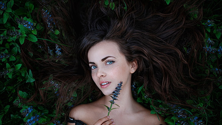 green leafed plants, women, Georgy Chernyadyev, brunette, blue eyes, flowers, long hair, model, freckles, face, HD wallpaper