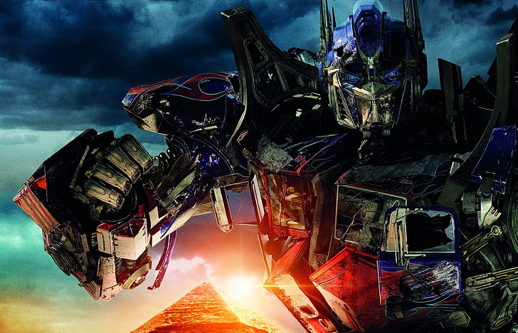 Transformers Optimus Prime digital wallpaper, the sky, the sun, clouds, weapons, fiction, robots, pyramid, Egypt, Transformers, the movie, battle, the Autobots, Revenge of the fallen, Transformers 2, Optimus Prime, Michael Bay, blue eyes, HD wallpaper