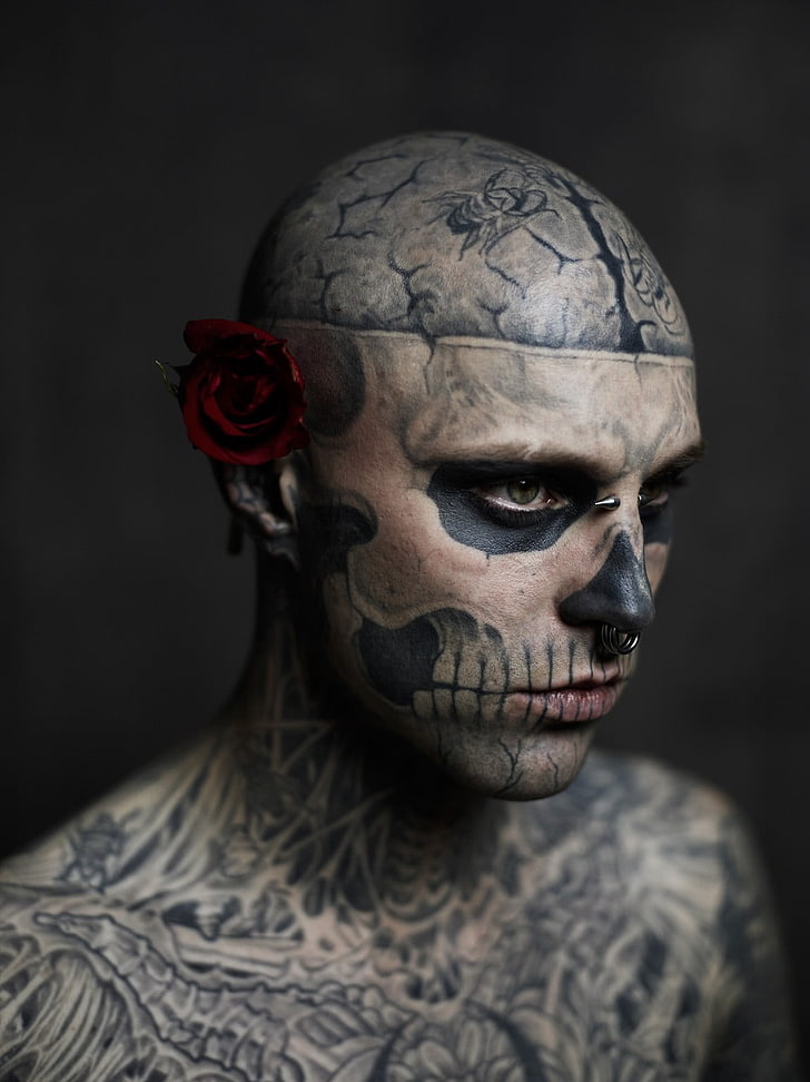 red rose, men, face, simple background, looking away, portrait, tattoo, Rico the Zombie, flowers, rose, piercing, pierced nose, shirtless, skull, portrait display, depth of field, shaved head, brain, creepy, Rick Genest, bald, HD wallpaper