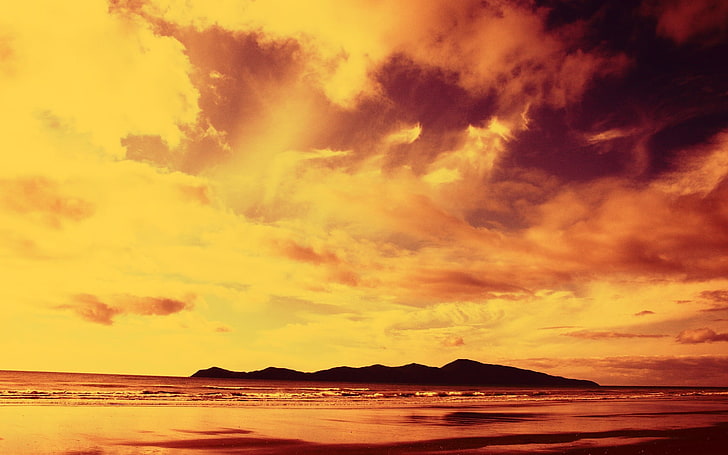 silhouette of island during golden hour, nature, filter, beach, clouds, sea, orange, mountains, horizon, yellow, waves, HD wallpaper