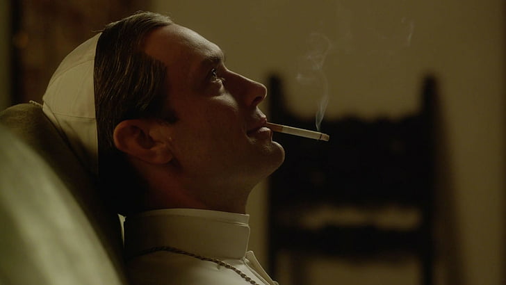 priest sitting on sofa inside room, The Young Pope, Jude Law, smoke, Diane Keaton, best tv series, HD wallpaper