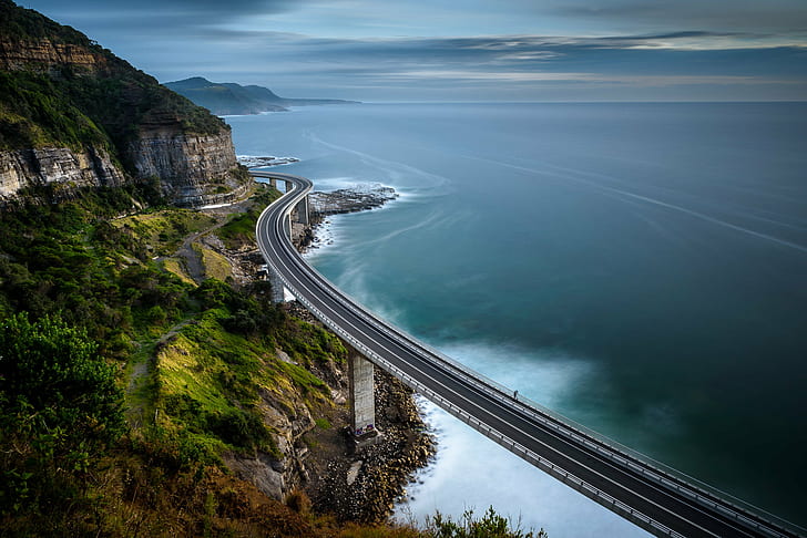 photo of gray concrete bridge on the ocean, Swept, photo, gray, concrete, ocean, water, sea cliff bridge, cpl, road, clouds, Clifton  New South Wales, Australia, AU, highway, cliff, landscape, scenics, nature, HD wallpaper
