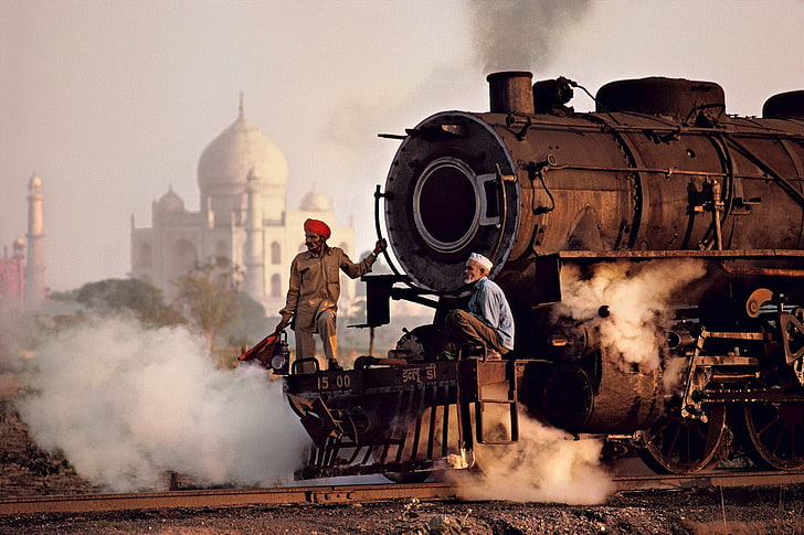 men's red turban headdress, man in-front of train, photography, India, steam locomotive, train, machine, Taj Mahal, railway, vintage, old people, signal, smoke, wheels, trees, looking away, pipes, sitting, standing, old, Steve McCurry, HD wallpaper