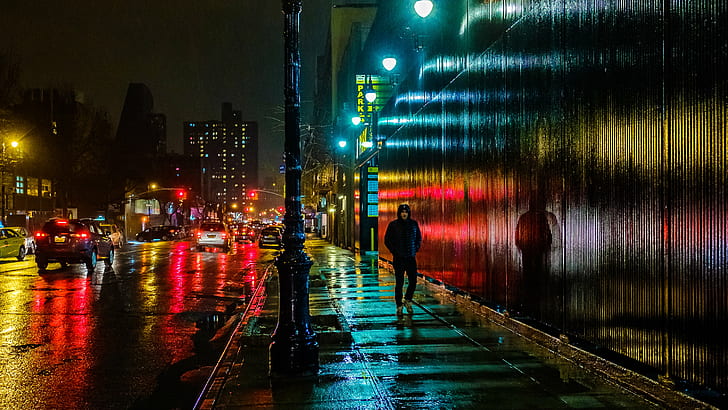 صورة لرجل يمشي عبر الزقاق ليلاً ، الجانب الشرقي ، الجانب الشرقي ، ليلاً ، مشهد حضري ، شارع ، مدينة ، منظر للمدينة ، حياة المدينة ، حركة المرور ، منطقة وسط المدينة ، مضاء ، هندسة معمارية ، ضوء الشارع، خلفية HD