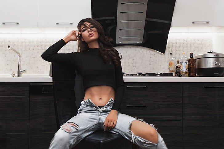 women's black long-sleeved crop top and distressed blue denim jeans, women, skinny, pants, torn jeans, sitting, looking at viewer, unbuttoned, HD wallpaper