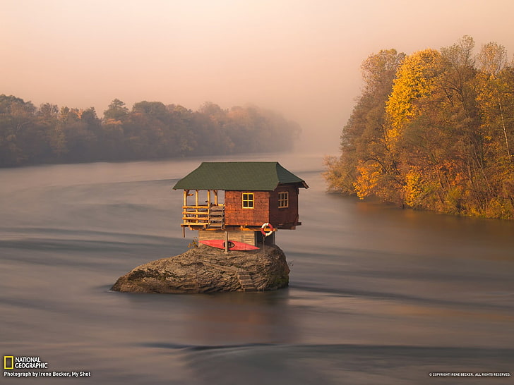 brown and green house, brown and green wooden house on top of large boulder on body of water, nature, landscape, building, house, Serbia, water, river, island, National Geographic, rock, trees, forest, fall, mist, kayaks, HD wallpaper