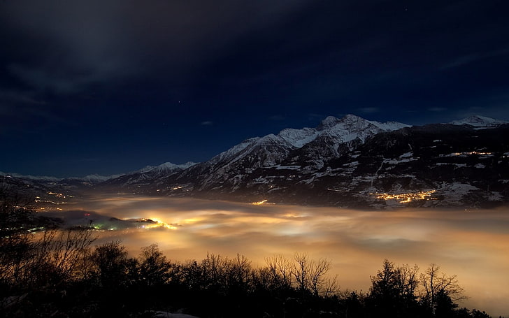 mountain rage under sea of clouds view during night time, nature, landscape, mist, valley, snow, mountains, lights, clouds, winter, stars, city, HD wallpaper
