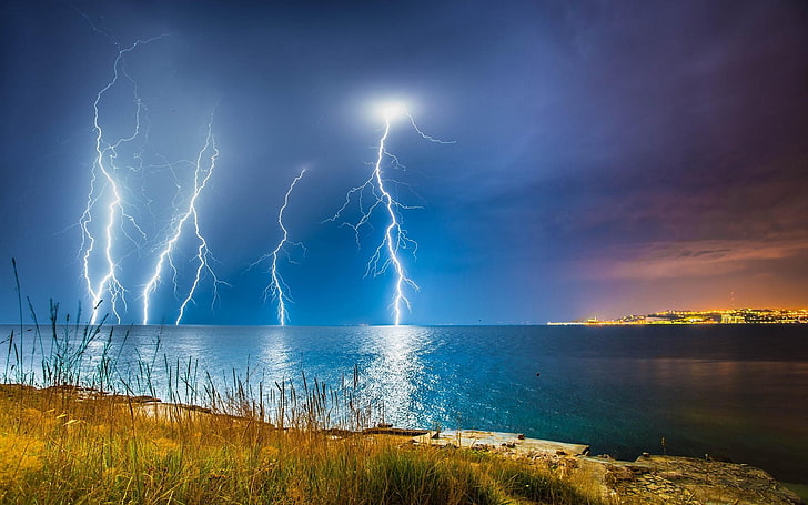 lightning above body of water, nature, landscape, lightning, coast, storm, sea, clouds, city, shrubs, HD wallpaper