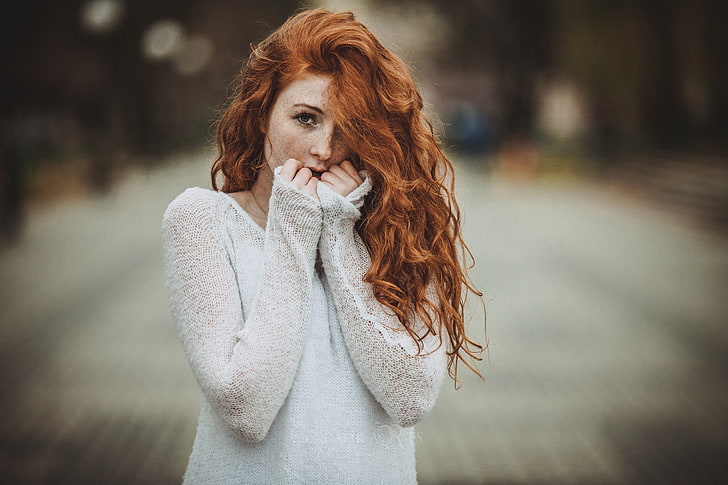 women's brown hair, redhead, women, looking at viewer, freckles, long hair, curly hair, hair in face, white sweater, women outdoors, model, urban, face, HD wallpaper