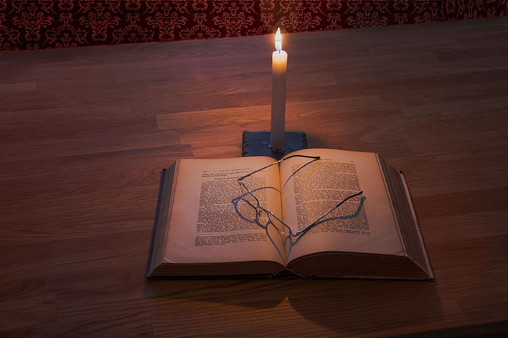 bible, book, candle, candlelight, dark, education, glasses, glow, heat, indoors, learn, learning, light, lit, page, paper, read, reading, retro, shadow, study, table, travel, wood, wooden table, HD wallpaper