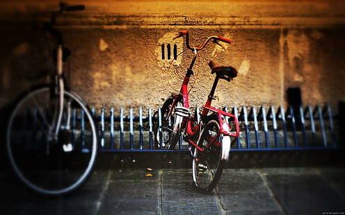 Red bike on a bike parking, red folding bicycle, bike, parking, red, vintage, bicycle, transport, HD wallpaper HD wallpaper