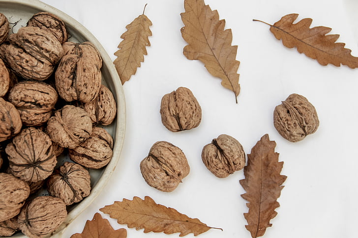 bowl, close-up, confection, delicious, diet, dry, epicure, fall, food, fruits, health, healthy, leaves, life, nutrition, nuts, still, sweet, tasty, walnut, HD wallpaper