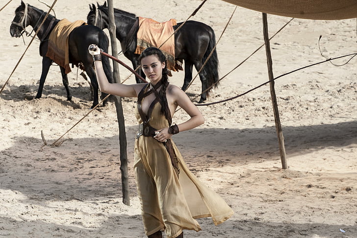 woman holding brown stick near black horse, Jessica Henwick, Game of Thrones, Nymeria Sand, HD wallpaper