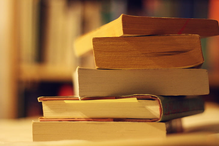 selective focus photo of layered books, book sale, loot, selective focus, photo, layered, books, stack, pile, paperbacks, soft  light, evening, citizen, library, five, colorful, bokeh, book, education, literature, learning, reading, textbook, university, wisdom, research, page, HD wallpaper