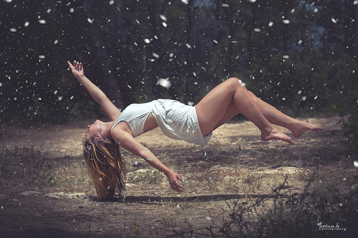 women's white sleeveless dress, floating woman wearing white top, blonde, women, floating, snowflakes, legs, feet, flying, confetti, barefoot, white dress, snow, wood, feathers, dress, forest, space, Arina Kortchov, beige, HD wallpaper