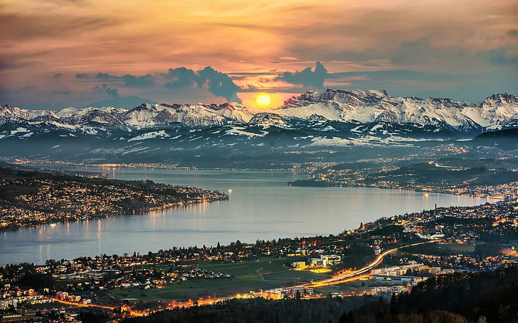 fotografía aérea de montaña con cuerpo de agua, vista del sol en las montañas, naturaleza, paisaje, panoramas, lago, Zurich, Suiza, paisaje urbano, montañas, pico nevado, cielo, nubes, luces, Fondo de pantalla HD