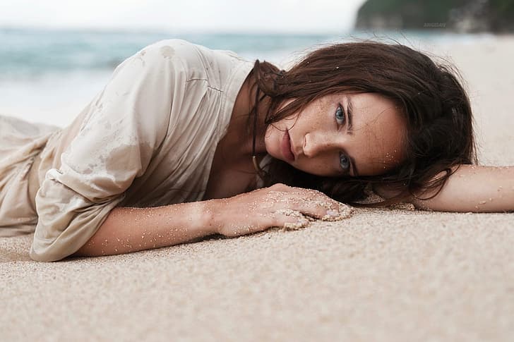 model, white clothing, lying on front, blue eyes, sand, women outdoors, women, HD wallpaper