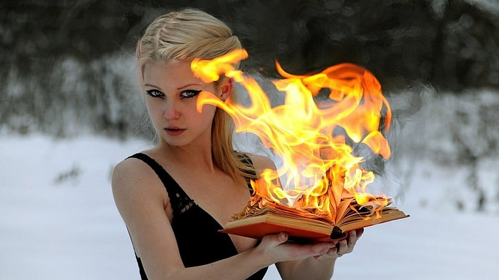 women's black sleeveless top, blonde, fire, books, green eyes, women, burning, fantasy girl, women outdoors, winter, HD wallpaper