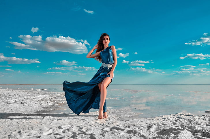 women's blue one-shoulder dress, women, brunette, women outdoors, long hair, dress, beach, sea, barefoot, legs, sky, tanned, Dim Khokhlov, HD wallpaper