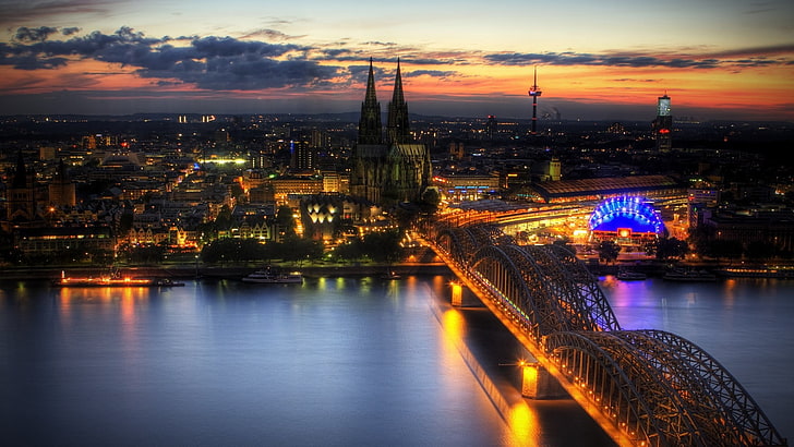 aerial photo of illuminated city, cityscape, bridge, building, HDR, lights, sunset, reflection, clouds, Cologne, Hohenzollernbrücke, Germany, HD wallpaper