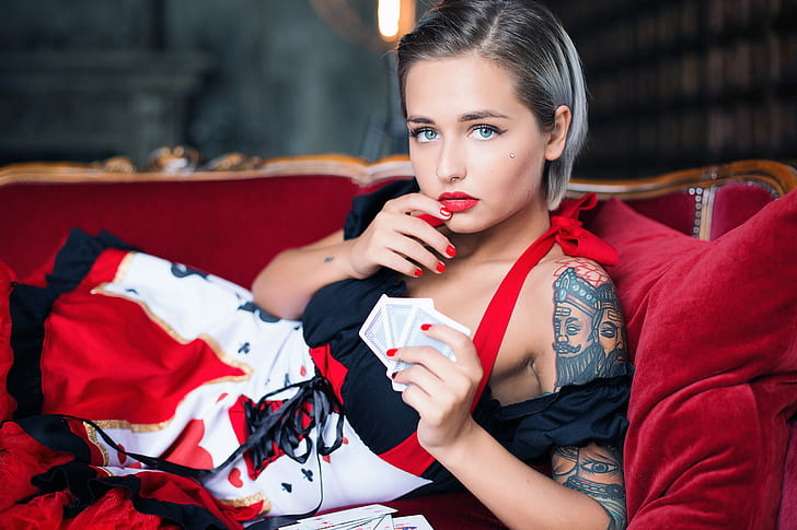 nose rings, piercing, depth of field, Suicide Girls, short hair, portrait, couch, red nails, women, playing cards, Valeriya suicide, tattoo, Valeriya, blue eyes, dress, red lipstick, HD wallpaper