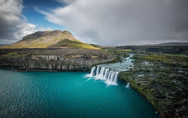 waterfalls body of water, waterfalls near mountain during daytime, landscape, nature, waterfall, Iceland, river, mountains, fall, turquoise, water, clouds, lava, field, cliff, lake, HD wallpaper