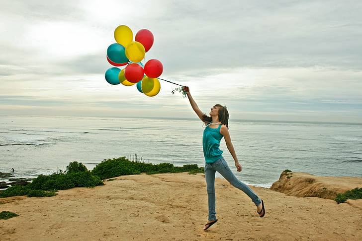 woman with blue tank top carrying a balloon near sea under blue sky, woman, tank top, balloon, sea, blue sky, jump, lexy, yellow, teal, cliffs, sweet, ect, sunset, green  blue, blue  water, photoshoot, bianca, courtney, concepts, women, outdoors, beach, one Person, dom, females, nature, cheerful, happiness, summer, people, sky, lifestyles, fun, HD wallpaper
