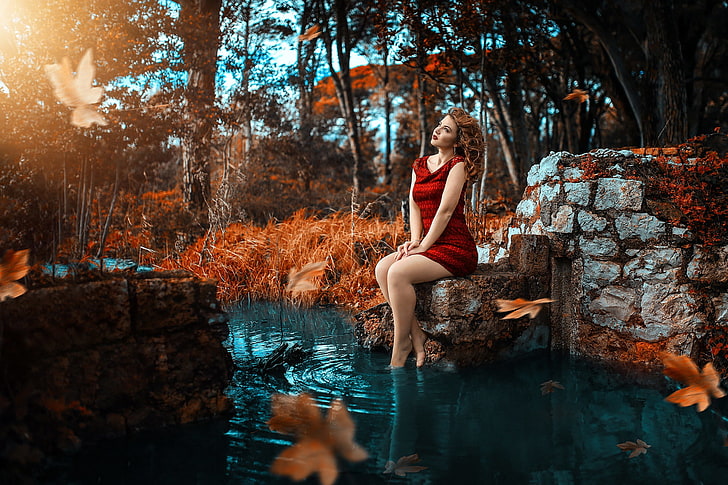 women's red sleeveless scoop-neck bodycon mini dress, Alessandro Di Cicco, fall, women, sitting, leaves, water, model, HD wallpaper