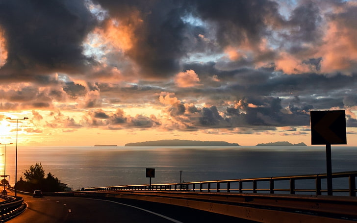 photography, landscape, road, water, sea, coast, highway, sunset, sunlight, orange, yellow, horizon, HD wallpaper