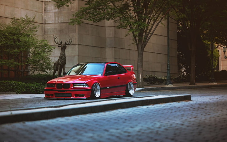 red coupe, car, BMW E36, Stance, tuning, lowered, German cars, street, trees, sculpture, BMW, yellow headlights, Hellaflush, HD wallpaper