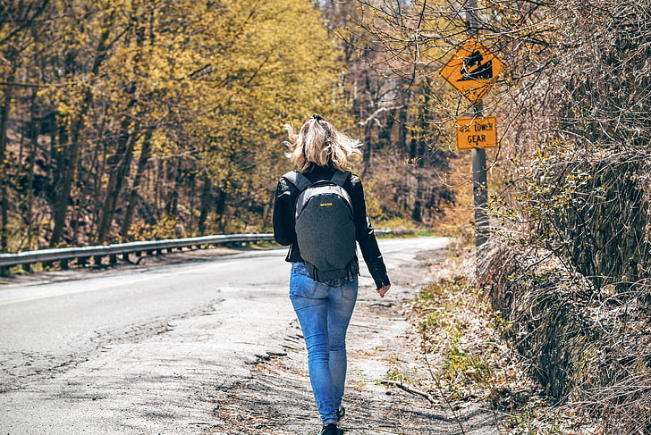 black backpack and women's blue skinny jeans, traveller, bag, alone, road, HD wallpaper